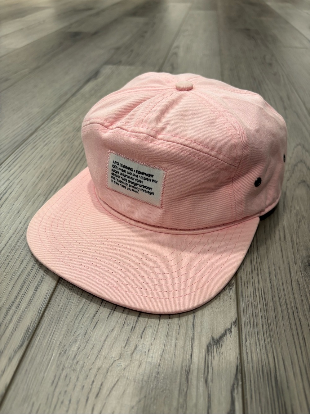 Lrg Pink Hat with Pink, Blue, and Yellow stitching details